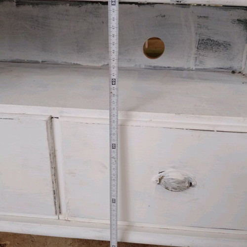IKEA wooden TV stand used with large storage space