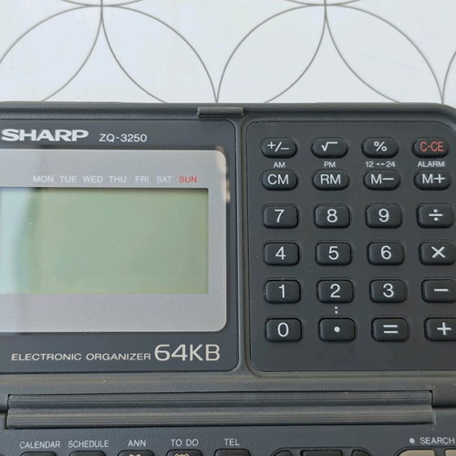 Sharp ZQ-3250 electronic organizer used, defective