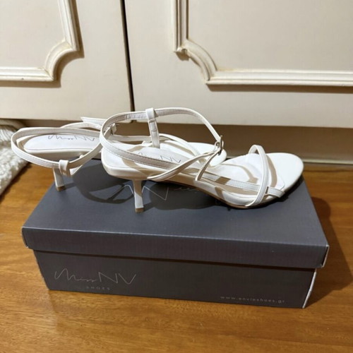 Envie white sandals with unique heel