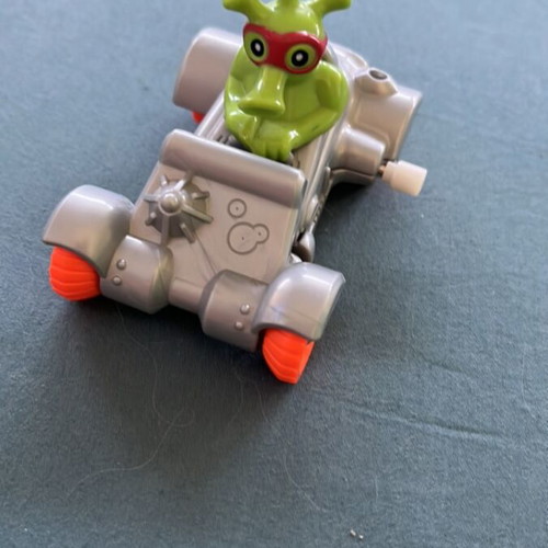 Toy car with alien like new