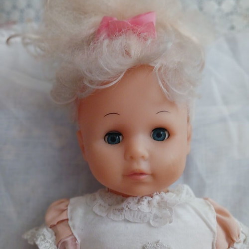 Vintage doll with handmade clothes like new