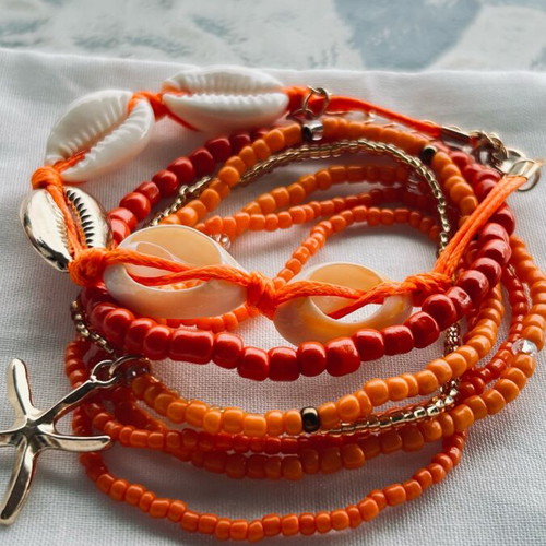 Set of 7 Boho Bracelets new with Shells and Starfish Orange