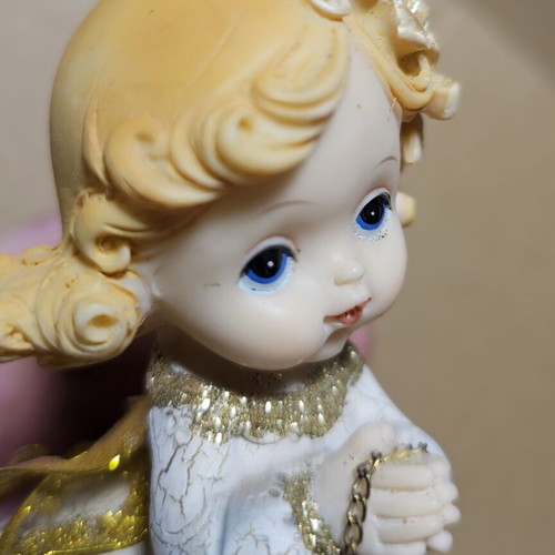 Ceramic decorative angel figurine used