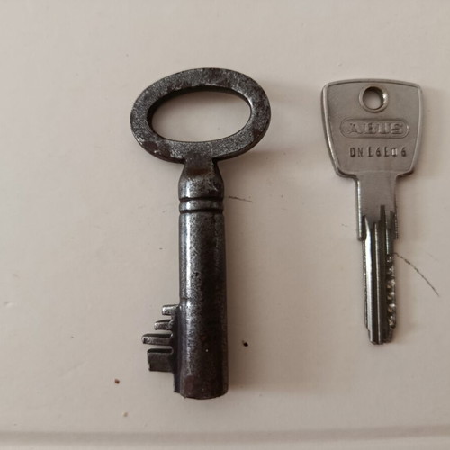 Old handmade key used, large and thick