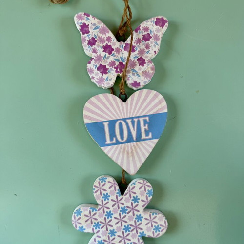Handmade hanging decoration with butterfly, heart and flower wooden motifs