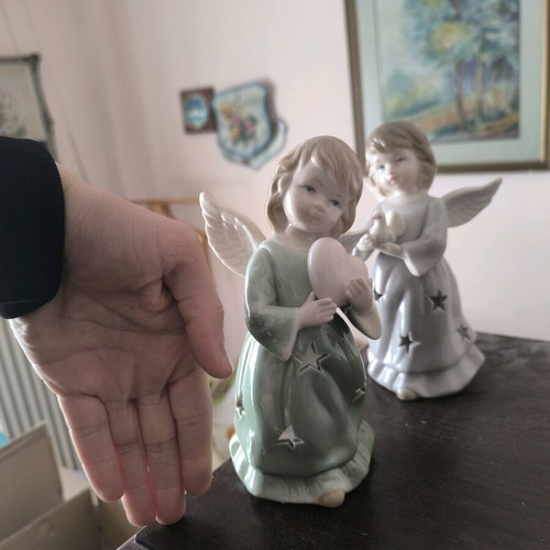 Angel candle holders like new, set of two