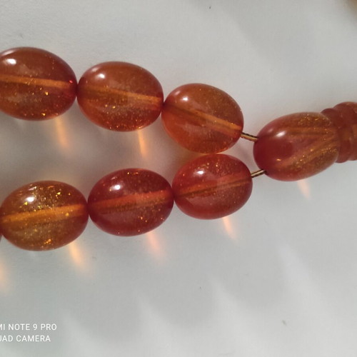 Mastic komboloi with orange shades, 33 beads