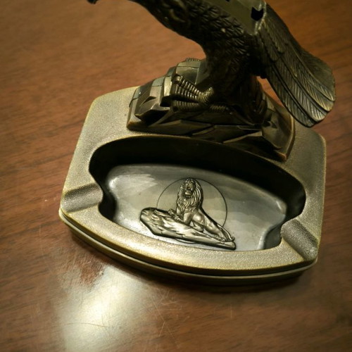 Metal ashtray lighter with two cigarette slots and plastic bird