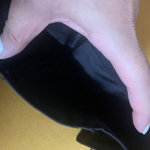 Guess wallet used, black canvas with faux croc details