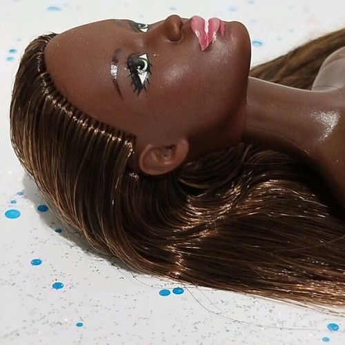 Barbie Made to Move African-American doll used with small flaws