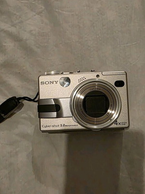 Sony V1 camera refurbished, for parts with charger