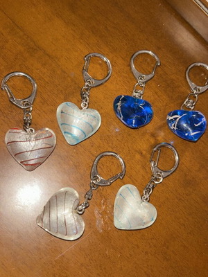 Set of 6 heart keychains like new in three colors