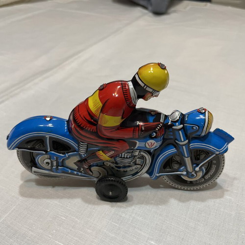 Motorcyclist tin toy like new, made in West Germany