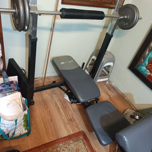 Weight bench with bar and weights used, iron