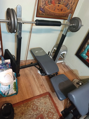Weight bench with bar and weights used, iron
