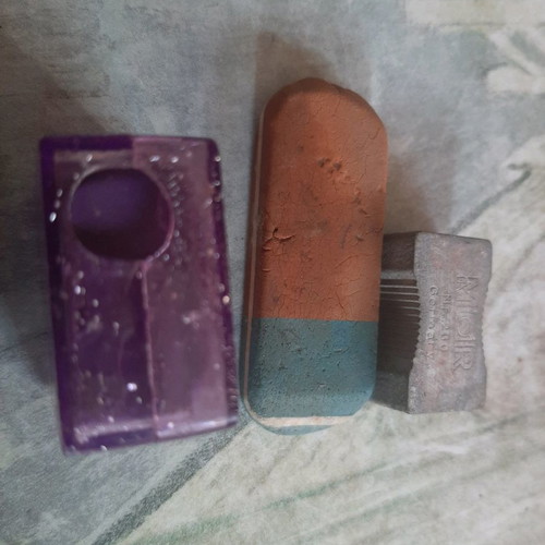 Vintage sharpener and erasers used, set