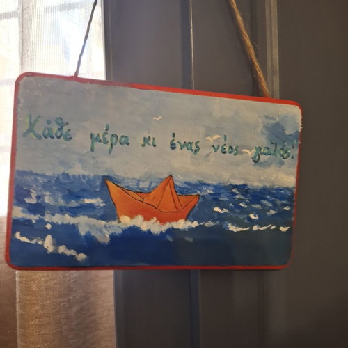 Handmade wooden sign "Every day a new shore"