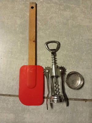 Silicone spatula, stainless steel corkscrew and filter used