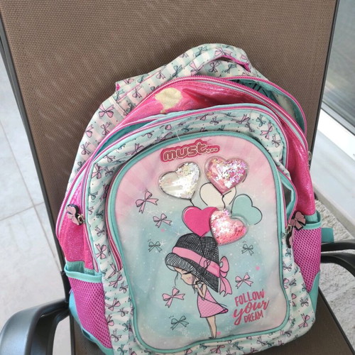 Primary school bag with wear on top