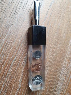 Vintage bottle opener with 3 used Canadian coins 1969