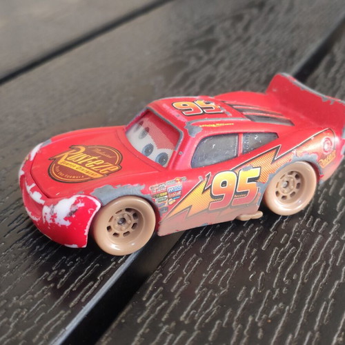 Disney Cars McQueen 1/55 toy car used with 3D eyes in fair condition