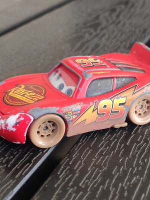 Disney Cars McQueen 1/55 toy car used with 3D eyes in fair condition