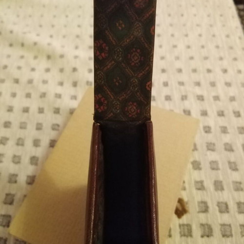 Cigarette pack case used, brown