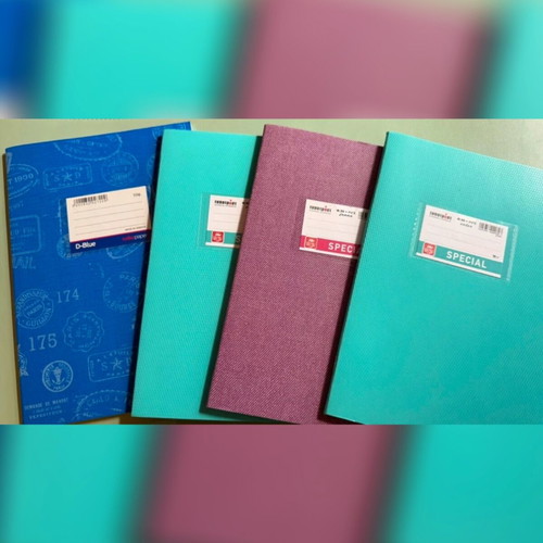 School supplies set with notebooks, pens, pencils, stickers, and case
