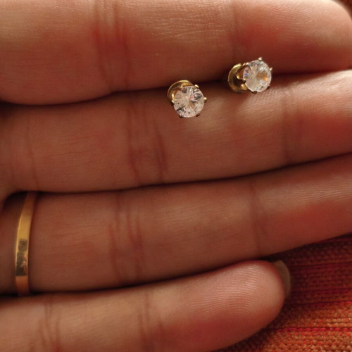 Gold-plated stud earrings with transparent zircon stones, like new