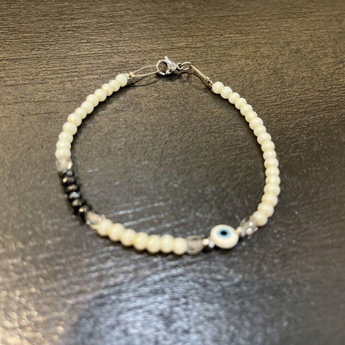 Handmade bracelet with beads, stainless steel clasp, like new, white