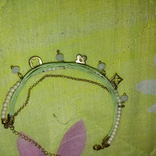 Bracelet used with hanging charms, cord, pearl and chain