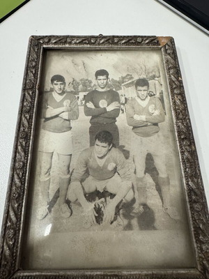 Old photograph with football players used