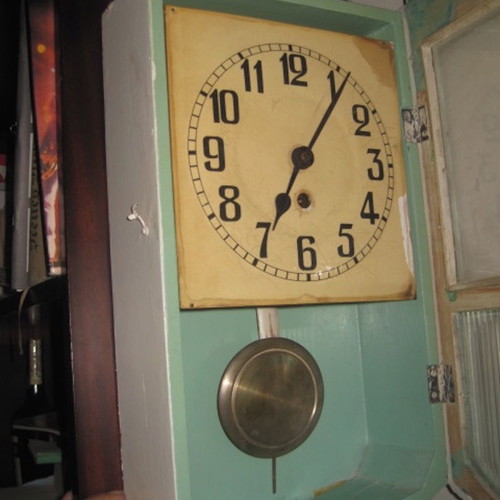 Wall clock wind-up used with pendulum from the 50s
