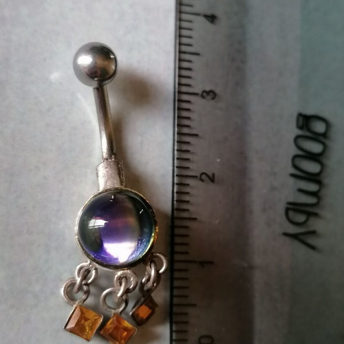 Aurora borealis navel piercing with color-changing crystal