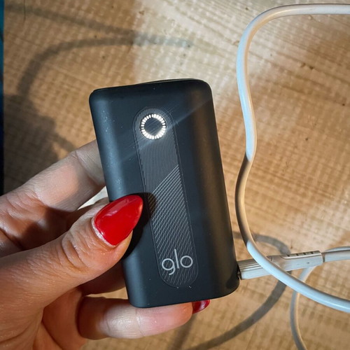 Glo Hyper Starter Kit used with cleaning brush and USB-C cable