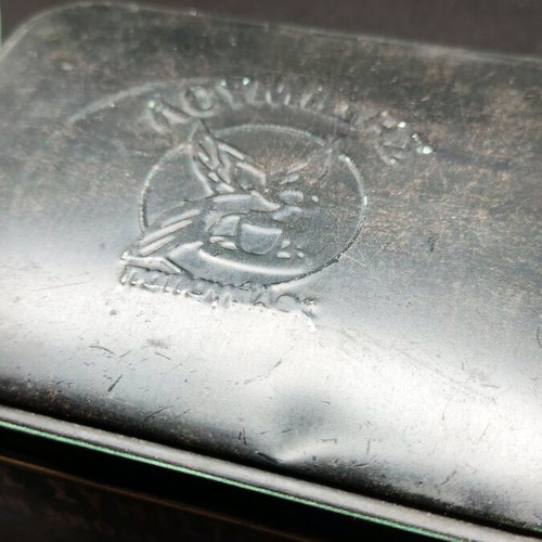 Vintage metal Loumidis tin used