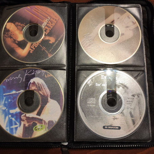 Set of 48 used music CDs with free case