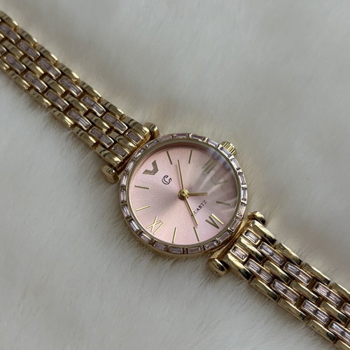 Women's watch with rhinestones and pink dial new