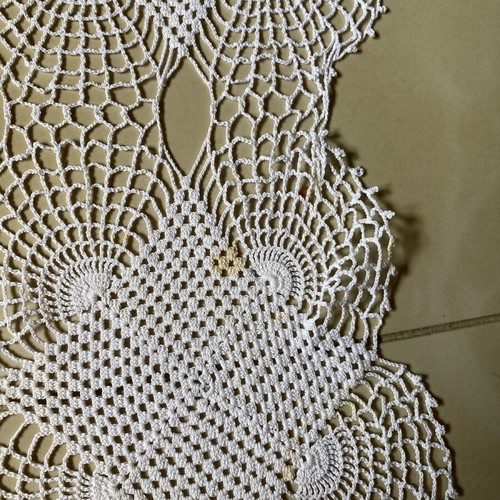 Handmade crocheted doily used with cotton thread