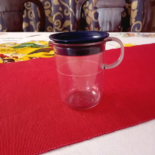 Vintage Tupperware jug with lid and handle like new