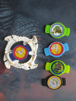 Beyblade parts and 5 Beyblade Bit chips used