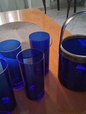 Set of 4 blue glass ouzo glasses and matching ice bucket like new