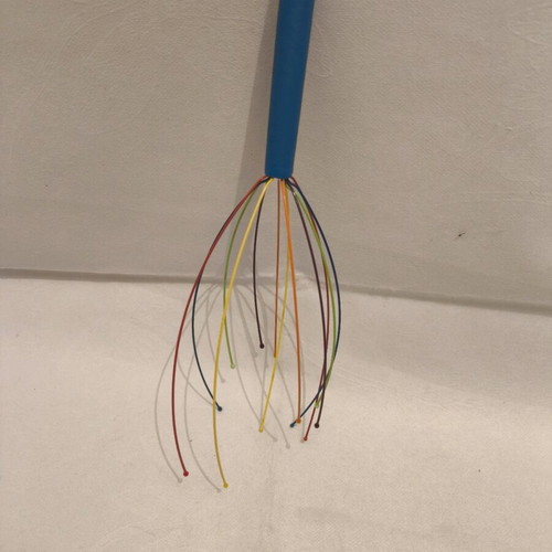 Head massage brush like new, multicolored