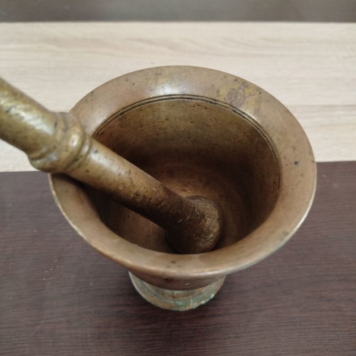 Vintage metal mortar and pestle used