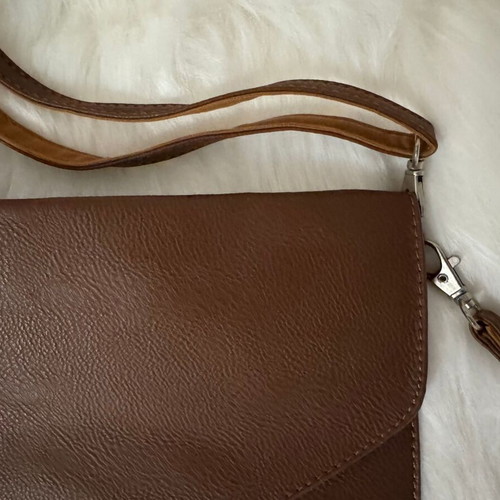 Leather envelope bag used, brown, with shoulder and hand strap
