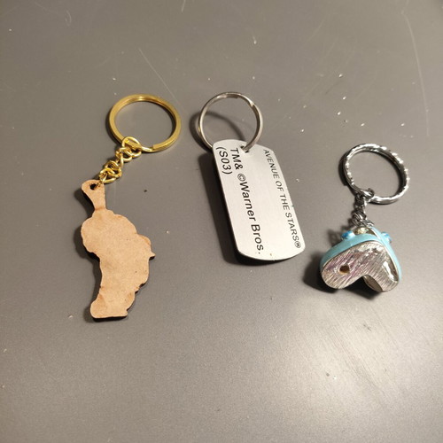Set of 3 keychains: Agnes Despicable Me, Taz Looney Tunes, blue baby shoes