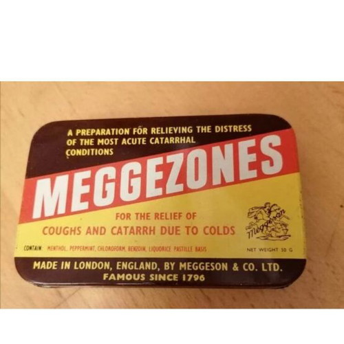 Meggezones vintage metal box for throat pastilles, used