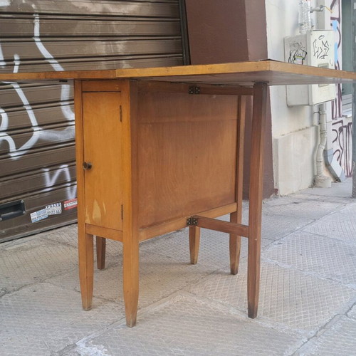 Dining table used with 2 drop-leaves and cabinet with shelf