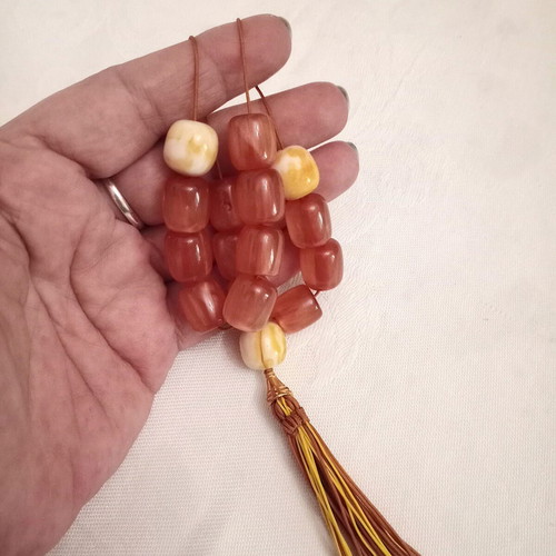 Worry beads with synthetic resin beads in orange color like new