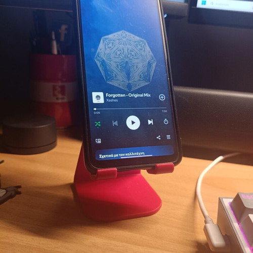 Mobile phone stand for desk with simultaneous charging, new